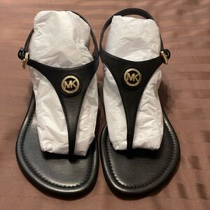 Michael Kors 7.5 Black Leather Thong Sandals. Gold MK Emblem. Worn 1x.